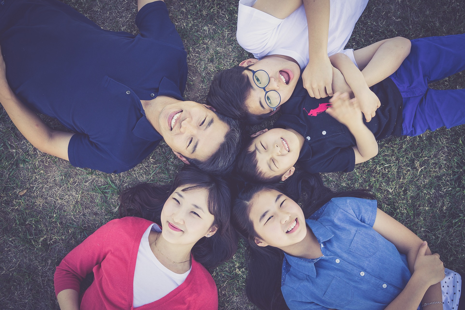 Friendship, youth and people concept - group of smiling teenagers with  hands on top of each other. Stock Photo by ©depositedhar 181726950